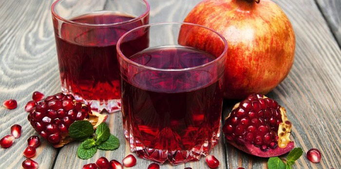 15 benefícios impressionantes do suco de romã